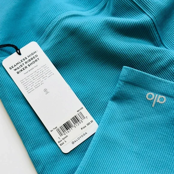 ALO Yoga Women's Seamless High Waist Ribbed Biker Shorts in Blue Splash - Picture 3 of 3